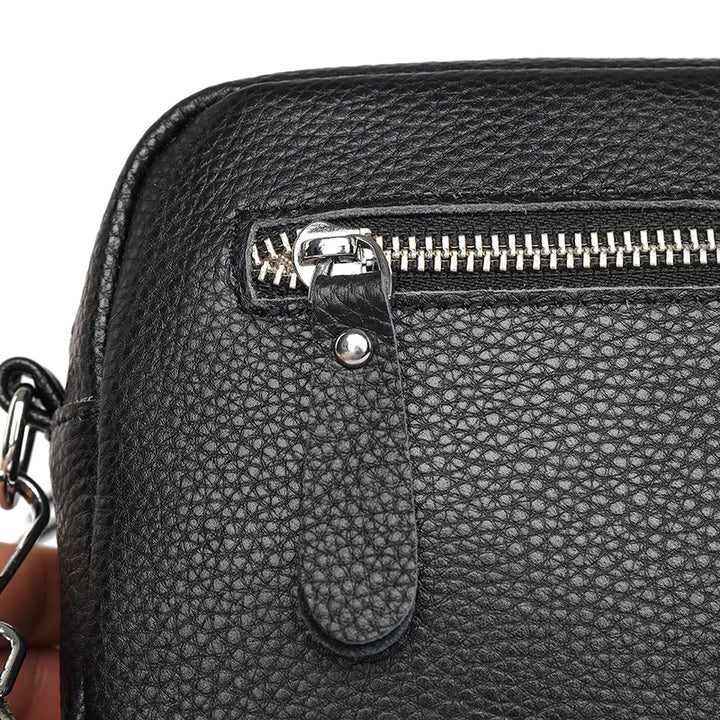 Mała kwadratowa skórzana listonoszka z paskiem